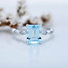 The default design option features 9x7mm Emerald Cut Aquamarine stone, VVS1-Clarity, VG-Cut, Ex-Polish, VG-Symmetry in 14K White Gold Engagement Ring. Model 569-9x7 Also you can fully customize and engrave this ring by clicking the button "Personalize in 3D". As well please remember it takes up to 19-21 days to make and ship this item. Emerald Cut Aquamarine Ring, Aquamarine Solitaire Ring, Ring Model, White Gold Engagement Ring, Aquamarine Ring, Aquamarine Stone, Rose Gold Engagement, Aquamarine Rings, White Gold Engagement