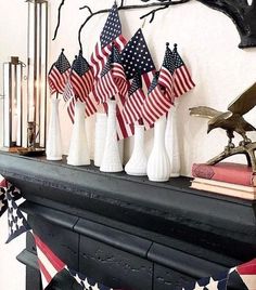 a mantle with american flags on it