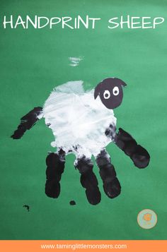 the handprint sheep is painted on green paper with black and white paint, it's made to look like an animal