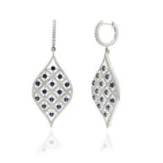 This is part of Chairish’s Fine Jewelry assortment.  Designer Blue Sapphire and Diamond Long Dangle Earrings to make a statement with your look. These earrings create a sparkling, luxurious look featuring oval cut gemstone. If you love to gravitate towards unique styles, this piece of jewelry is perfect for you.  PRODUCT DETAILS :-  > Material - 14K Solid White Gold > Gemstone - Blue sapphire  > Gemstone Weight - 1.88 ct > Gemstone Shape - Round  > Gemstone Pcs - 28   > Gemstone Size - 2.5 mm > Diamond Weight - 1.27 ct > Diamond size - 1 mm > Gross Weight - 13.79 Grams > Setting - Prong setting > Length - 55 mm  > Width - 21 mm Elegant Blue Diamond Cut Earrings, Elegant Oval Diamond Earrings With Gemstones, Elegant Blue Oval Diamond Earrings, Elegant Marquise Earrings With Diamond Accents, Fine Jewelry Marquise Earrings For Evening, Modern Marquise Earrings For Formal Occasions, Elegant Oval Sapphire Earrings, Elegant Oval Diamond Cut Earrings, White Gold Oval Earrings For Parties