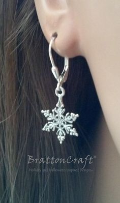 These sterling silver snowflake earrings are very pretty! The detailed snowflake charm is sterling silver and measures (without the attached ring) 14.5mm or .57 inches in diameter. The leverback is sterling silver with a tear drop accent. These lovely earrings are ready to ship and will arrive in a gift box. Check out the matching Snowflake Necklace and other snowflake jewelry here: https://www.etsy.com/shop/BrattonCraft?ref=listing-shop2-all-items-count&search_query=snowflake Check out othe Silver Snowflake Jewelry For Holidays, Holiday Sterling Silver Jewelry, Holiday Silver Snowflake Jewelry, Sterling Silver Snowflake Jewelry For Winter, Sterling Silver Jewelry For Winter Gifts, Silver Jewelry As Winter Gift, Silver Jewelry For Winter Gift, Elegant Nickel-free Jewelry For Holiday, Sterling Silver Snowflake Jewelry