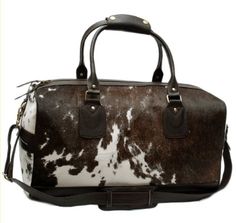 Introducing the exquisite Cowhide Leather Duffle Bag - KDL-10 by Celestial Leather London. Crafted with premium cowhide leather, this chic and spacious duffle exudes luxury. Perfect for travel and everyday use.