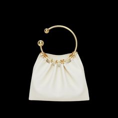 Details Charming and versatile, this Gold-Plated Ring Handle Bag can be styled for your perfect evening dinner outfit! No matter the style of wear, the soft leather is a bronze example of quality. 100% Cow Leather. Size Length: 21cm  Height: 17cm Handle Diameter: 11.5cm Weight: 200g Shipping & Return Free US shippi Elegant Evening Bag With Gold-tone Hardware And Round Handle, Chic Formal Evening Bag With Round Handle, Elegant Clutch With Round Handle For Formal Occasions, Elegant Formal Clutch With Round Handle, Elegant Leather Clutch With Round Handle, Elegant Evening Clutch With Round Handle, Chic Evening Bag With Round Handle, Elegant Leather Shoulder Bag With Pearl Handle, Chic Evening Clutch With Round Handle