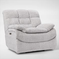 the reclining chair is upholstered and ready to be used in any room