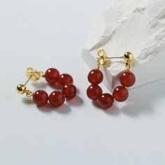 Celebrate the New Year in style with our elegant red agate beaded earrings. Made with durable S925 silver and featuring a thoughtful design, they are the perfect accessory to add joy and sophistication to any outfit. Metal: 18K Recycled Gold Plated On Brass/925 Sterling Silver Ear Needle Gemstone: Red Onyx Agate Dimensions: 4mm/6mm Dimensions: 4mm earrings 18mm/6mm earrings 23mm Single Weight: 1.2g/2.2g Elegant Amber Round Bead Earrings, Red Agate Earrings With Natural Stones, Elegant Gemstone Beaded Earrings For Gift, Red Agate Earrings For Gift, Red Agate Earrings As Gift, Red Earrings With Natural Stones In Round Beads, Elegant Beaded Earrings With Natural Stones For Gift, Elegant Gemstone Beads Drop Earrings, Elegant Round Beaded Earrings With Natural Stones