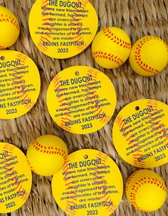 several yellow softballs with the words the dugout written on them in different languages