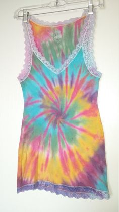 Custom made tie dyed tank top women's size Medium. All sales are final, no exchanges or refunds. Tie Dye Sleeveless Tank Top For Summer, Tie Dye Tank Top For Summer, Fitted Tie Dye Tank Top For Summer, Tie Dye Sleeveless Top For Summer, Multicolor Vest Tank Top For Festival, Sleeveless Tie Dye Tops For Summer, Sleeveless Tie-dye Tops For Summer, Hand Dyed Multicolor Sleeveless Tops, Multicolor Hand Dyed Sleeveless Tops