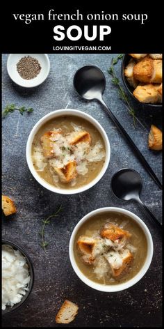 two bowls filled with soup next to spoons