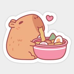 a brown bear eating out of a pink bowl with chopstickers on the side