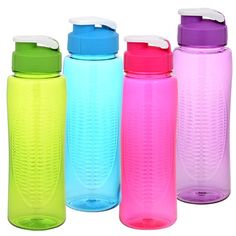 four different colored water bottles lined up next to each other