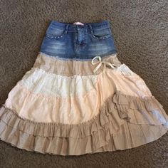 a skirt made out of old jeans on the floor