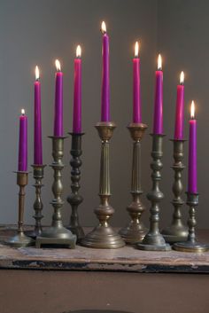 a group of candles sitting next to each other