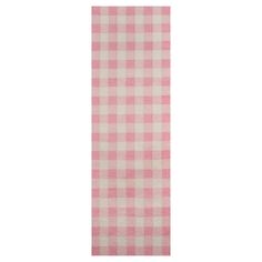 a pink and white checkered table cloth