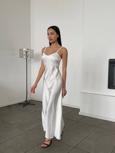 White satin dress. Womens Stunning silk slip dress V-neck. Maxi Satin slip dress for events. Briedsmaids white silk dress. Material: Silk + polyester Colours: Milky White, Ivory, Emerald, Royal Blue, Black SIZE/LENGTH: the length WITHOUT STRAPS XS,S,M,L- 118 cm (46,45'') We can customize length for you as well. Model on the Foto 171cm-67,3'', S size PRODUCT CARE - It is recommended to handwash 30oC. -twist carefully Feel Free to Ask Any Question about Sizing and Fit. FREE DELIVERY WORLWIDE! White Civil Wedding Dress, White Elegant Dress, 90s Slip Dress, White Satin Dress, White Silk Dress, Civil Wedding Dresses, Silk Satin Dress, White Slip Dress, Silk Satin Fabric