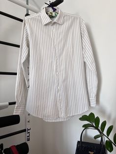 The Hermes Man's shirt is in great condition, without any defects length 75cm / 19.5in shoulders 46cm / 18in bust 59cm / 23.2in waist 55cm / 21.6in sleeve 63.5cm / 25in Office Cotton Shirt With Vertical Stripes, Pinstripe Cotton Shirt For Work, Pinstripe Shirt With Striped Collar, Pinstripe Cotton Shirt With Striped Collar, Workwear Shirt With Vertical Stripes And Spread Collar, White Cotton Dress Shirt With Striped Collar, Cotton Vertical Stripes Collared Shirt, Striped Cotton Shirt For Work, Formal Cotton Shirt With Striped Collar