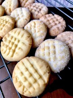 several different types of cookies cooling on a rack