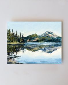 a painting of a lake with mountains in the background