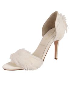 a white high heel shoe with feathers on the toes and heels are made from sued