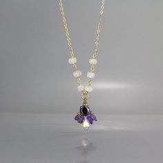 CZ  Necklace, CZ Amethyst Beaded Bee Necklace, Gemstone Necklace, Beaded Pendant Necklace, Amethyst Birthstone Necklace, February BirthstoneThis lovely hand crafted pendant necklace features natural moonstones beaded on a gold filled chain.The pendant is inspired by the honey bees in nature, made of purple zircon bezel set in copper, amethyst and Czech crystal. Beaded bee necklace is delicate, unique and eye catching piece.Measurements:Pendant length: approx. 2 cm - 2.5 cmNecklace length - betwe Amethyst Crystal Necklaces With Gemstone Accents For Jewelry Making, Purple Crystal Necklaces With Gemstone Accents, Purple Crystal Necklace For Jewelry Making, Purple Crystal Necklaces With Gemstone Accents For Jewelry Making, Amethyst Birthstone, Bee Necklace, Cz Necklace, Beaded Pendant Necklace, Moonstone Beads