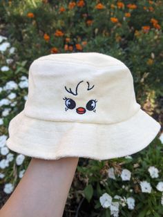 If you love Stray Kids and therefore Skzoo, this was made for you. Perhaps the CUTEST way to rep your bias in a subtle way. I love this bucket hat since it's made from 100% cotton terry cloth which gives it a trendy but still unique feel. If you have more than one bias (which who doesn't), or want to match with someone else, I do have the whole skzoo collection up in my shop! Most members I have as both a cap and a bucket hat, so whatever you need, I have covered.  This product is made especially for you as soon as you place an order, which is why it takes us a bit longer to deliver it to you. Making products on demand instead of in bulk helps reduce overproduction, so thank you for making thoughtful purchasing decisions! Adjustable Cute Cotton Bucket Hat, Funny White Hat As Gift, Funny White Hat As A Gift, Cute Yellow Adjustable Bucket Hat, Funny White Hat For Gift, Cute Adjustable Bucket Hat, Cute Adjustable Yellow Bucket Hat, Cute Adjustable Brimmed Bucket Hat, Playful Adjustable Cream Hat