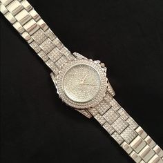 Stunning! Bold Rhinestone Encrusted Silver Watch! What A Statement Piece! Fits Up To A 8” Wrist, Has Removable Links For Size Adjustment. It’s Been Tucked Away In My Jewelry Armoire And Never Been Used... Just Needs A Battery. If You Are A Bling Queen, You Need This! Smoke Free. Silver Diamond Watch With Cubic Zirconia Bling, Silver Diamond Watch With Rhinestones And Crystal, Diamond Watch With Rhinestones For Party, Silver Diamond Watch With Rhinestones, Silver Watch With Rhinestones And Cubic Zirconia, Silver Cubic Zirconia Watch With Rhinestones, Silver Diamond Watch With Cubic Zirconia For Parties, Silver Cubic Zirconia Diamond Watch For Party, Silver Watches With Rhinestones