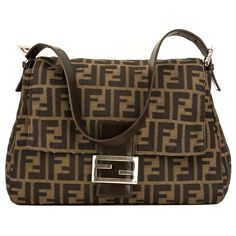 This , pre owned Fendi Zucca Shoulder Bag. It features the classic Fendi mono zucca canvas exterior with a leather top handle, brown leather trimmings, a zipper pocket, and a flap closure. A perfect find for the Fendi lover in you. This super cute Fendi brown zucca canvas shoulder bag makes a perfect everyday bag. It is a timeless and durable piece and will hold your necessities in style while complementing any outfit. Made in Italy. This item is in good condition, will have some noticeable signs of wear and/or use. Please view photos carefully for details. Pay close attention to sizes and measurements.Note: Our Items are totally New High quality Brand Inspired Refurbished. Please make sure you are well aware of it before buying any of the Item. T&C's Apply in case of s. Please send us mes Fendi Replica Clothing, Back To School Backpacks, Shopping Tote Bag, Canvas Shoulder Bag, Everyday Bag, Leather Top, View Photos, Louis Vuitton Damier, Bag Making