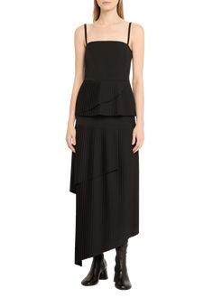 Find MAISON MARGIELA Long Pleated Skirt on Editorialist. MM6 Maison Margiela maxi skirt finished with pleating High rise Side seam pockets; back welt pockets Dropwaist silhouette Asymmetric hem Concealed button/zip fly; belt loops Polyester/Proviscose® rayon/elastane Lining: Proviscose® rayon Dry clean Made in Italy Asymmetrical Pleated Maxi Skirt For Evening, Fitted Tiered Maxi Skirt With Pleated Waist, Evening Pleated Dress With Asymmetrical Skirt, Accordion Pleated Tiered Skirt For Evening, Evening Tiered Accordion Pleats Skirt, Chic Evening Maxi Skirt With Accordion Pleats, Chic Evening Maxi Skirt With Pleated Hem, Long Evening Maxi Skirt With Pleated Hem, Evening Tiered Skirt With Accordion Pleats