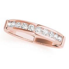 a rose gold wedding ring with five stones on the bottom and four rows of diamonds in each row