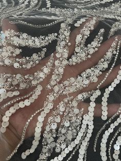 This high quality Fabric is measured in 5 Yards With Embroidered Beading and Sequin. It is soft, very delicate and beautiful. This high Quality Fabric is made with Fashion embroidered rhinestones can be used in making party wedding dresses, skirts, shawls, scarves and other other fashion apparels as you would like. Size : Length : 5 yards (180 inch). Width: 50 inch (Please allow slight deviation for the measurement data ,±1 inch) Material: 100% Polyester, Tulle Lace Fabric, Eco-Friendly embroide Luxury Embroidery, Mesh Embroidery, Dress Embroidery, Stunning Wedding Dresses, Wedding Fabric, Plant Flower, Embroidery Fabric, Drapery Fabric, Tube Beads