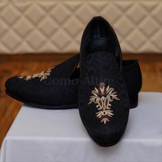 Self textured black shoes with hand embellishments for wedding Black Wedding Shoes Men, Wedding Groom Shoes, Elegant Embroidered Wedding Shoes, Traditional Embellished Wedding Shoes For Formal Occasions, Black Almond Toe Wedding Shoes, Black Leather Wedding Shoes, Black Wedding Loafers With Almond Toe, Elegant Embroidered Wedding Shoes For Evening, Black Almond Toe Loafers For Wedding