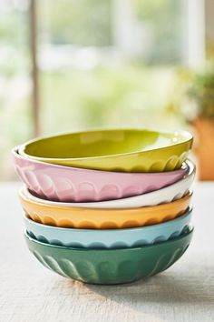 four bowls stacked on top of each other