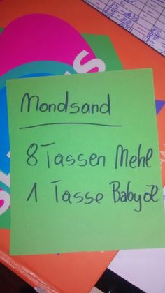 there is a sign on the table that says, monssand 8 tassen mehe a tasse babye