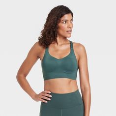 Why we're ALL IN: Embossed high-support sports bra takes you through exercise in comfort with moisture-wicking and quick-drying properties to help keep you cool, and adjustable front straps that help you find the right fit. Wireless, molded cups offer a customizable fit, and the bra is finished with a V-neck back for sporty flair. All in Motion™: Made for every move, priced for every day. All In Motion, Racerback Sports Bra, Sports Bra Sizing, Bra Cups, Pair Of Pants, Body Measurements, Active Wear For Women, Sports Bra, Active Wear