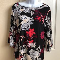 Bell Sleeved Blouse. Beautiful To Wear To Work Or Dress Up Some Jeans Elegant Black Tops With Floral Print, Elegant Black Floral Print Tops, Black Floral Print Tops For Fall, Spring Black Flowy Blouse, Black Flowy Blouse For Spring, Flowy Black Top With Floral Print, Chic Black Floral Print Tops, Black Flowy Tops For Workwear, Elegant Floral Print Patterned Tops