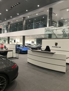 a car showroom filled with lots of cars