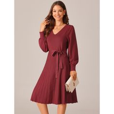 This enchanting dress features a flattering V-neckline that beautifully frames your collarbone, a self-tie waist that accentuates your curves, and a pleated bottom that adds a touch of sophistication to your every step. The high waist belted design flatters your waistline while the pleated A-line skirt adds a girlish charm. Perfect for various occasions such as casual outings, office wear, vacations, holidays, dates, anniversaries, ceremonies, parties, cocktails, and weddings. The casual pull-on Fall V-neck Midi Dress With Tie Waist, Chic Red V-neck Dress For Fall, Belted V-neck Midi Dress For Fall, Fall V-neck Belted Dress, Red V-neck Midi Dress With Tie Waist, Elegant Red V-neck Dress For Fall, Enchanting Dress, Pleated Knit, Ballet Dress