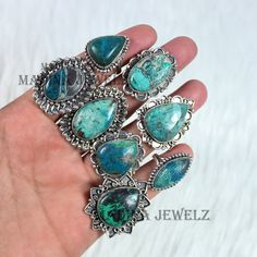 DESCRIPTION Gemstone Name : Natural Chrysocolla  Cut : Designer Ring  Shape : Mix Shape & Size  Length : Between 6 to 8 US (approx.) Plating : Silver Plated Style : Statement Ring/Wedding Ring/Gift Ring Country/Region of Manufacture : India Made In : Jaipur Rajasthan  https://www.etsy.com/in-en/shop/MadinaJewelz?ref=seller-platform-mcnav The pictures shown are of the actual product that you will receive. Please note stone colors may look slightly different depending on your monitor calibration. Chrysocolla Ring, Unique Ring Designs, Girls Ring, Country Rings, Ring Shapes, Jaipur Rajasthan, Rings For Girls, Gift Ring, Style Statement