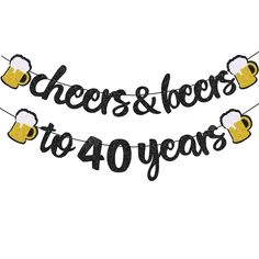 cheers and beers to 40 years banner with beer mugs hanging from the string on white background