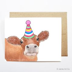 a card with a cow wearing a party hat on it's head and looking at the camera