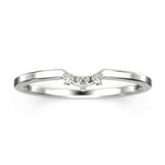 a white gold ring with three diamonds on it