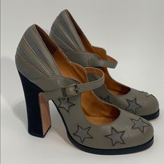 N.Y.L.A. Leather Grey With Slate Blue Suede Inset Stars And Stripes 5” Heels. Never Worn! Size 10 Stars And Stripes, Slate Blue, Blue Suede, Blue Gray, Shoes Women Heels, Blue Grey, Shoes Heels, Color Blue, Size 10