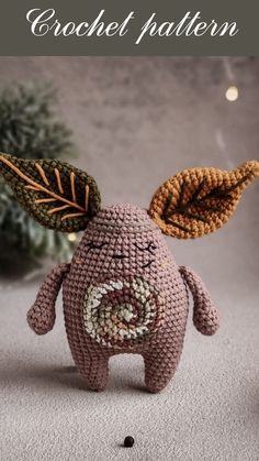 a crocheted toy with leaves on it and the words crochet patterns above it