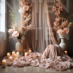 an arrangement of flowers and candles on the floor in front of a curtained window