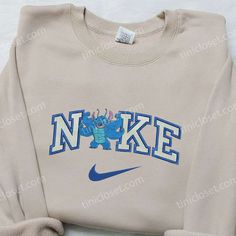 Introducing the Muscle Stitch x Nike Embroidered Sweatshirt. This unique collaboration combines the iconic Muscle Stitch character with the renowned Nike Vintage Sweatshirt Stitch, Pull Nike Stitch, Chibi Spider, Nike Embroidered Sweatshirt, Nike Inspired, Sweatshirt Nike, Cute Nike Outfits, Embroidered Shirts, Black Costume