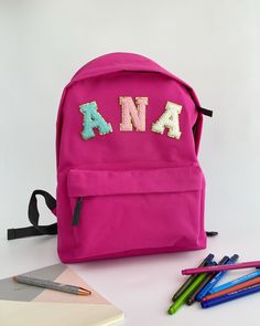 Personalised Backpack Customisable Backpack Letter Backpack Back to school kindergarten backpack Junior gift children Introducing our delightful collection of backpacks, specially designed for young adventurers and ideal for kindergarten and young children. Crafted with utmost care and attention to detail, these backpacks offer the perfect blend of comfort, safety, and style to make every day a joyful exploration. Padded adjustable shoulder straps. Zippered front pocket. Padded back panel. Grab Pink Backpack For Daycare And Back To School, Back To School Backpack With Letter Print For Students, Pink Backpack For School Events, Softback Bags For Back To School, Back To School Softback Bags For School Events, Pink Backpack For End Of School Year Gift, School Backpack For Back To School, Pink Backpack Gift For End Of School Year, Pink Softback Backpack For End Of School Year