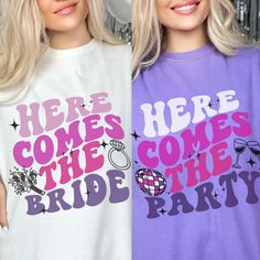 two women wearing t - shirts that say here comes the bride and here comes the party