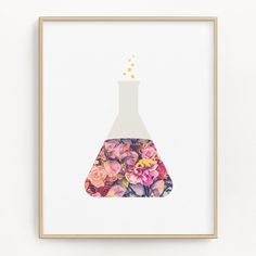 a floral print with a flask filled with pink and yellow flowers in front of a white wall