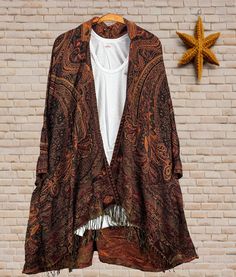 Reversible Pashmina Kimono Cardigan | Dark Brown and Black A fantastic way to stay both stylish and warm. Say goodbye to the struggle of keeping a scarf in place and hello to a chic and comfortable alternative. The free-size kimono offers a fashionable solution to stay comfortable while effortlessly maintaining your style. Crafted from luxurious pashmina fabric, this versatile piece features a stunning paisley pattern in purple and turquoise blue. Whether you're relaxing at home or stepping out Bohemian Shawl For Fall Layering, Bohemian Brown Outerwear For Layering, Brown Long Sleeve Shawl For Fall, Long Sleeve Brown Shawl For Fall, Bohemian Fall Outerwear With Paisley Print, Fall Bohemian Outerwear With Paisley Print, Fall Bohemian Paisley Print Outerwear, Bohemian Brown Shawl With Paisley Print, Fall Paisley Print Pashmina Shawl