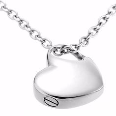 "Urn necklace, gift for loss, Locket Heart, cremation memorial, ashes urn, ashes holder, heart necklace jewelry, keepsake pendant Urn jewelry Stainless Steel Small Heart Locket Heart cremation memorial necklace ashes urn heart necklace keepsake pendant Gift for loss Comes with a 20\" chain, a fill kit, and a black velvet gift bag. The locket is 3/4 of an inch across and length wise. I don't offer personalized engraving - you will have to take it to a jewelry store or jewelry repair for that serv Stainless Steel Heart Charm Necklace For Keepsake, Stainless Steel Heart Necklace With Heart Charm For Keepsake, Stainless Steel Heart Pendant Necklace For Keepsake, Heart Pendant Necklace In Stainless Steel For Keepsake, Keepsake Heart Necklace With Stainless Steel Heart Charm, Keepsake Heart Pendant Necklace In Stainless Steel, Keepsake Stainless Steel Heart Pendant Necklace, Silver Heart Pendant Necklace For Remembrance, Urn Ashes