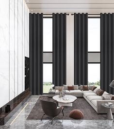 a modern living room with black and white walls, marble flooring and large windows